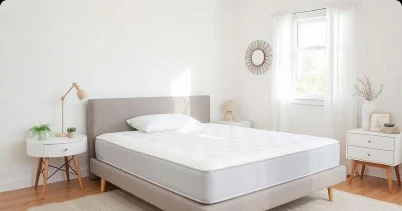 Mattress on a bed in a bright bedroom